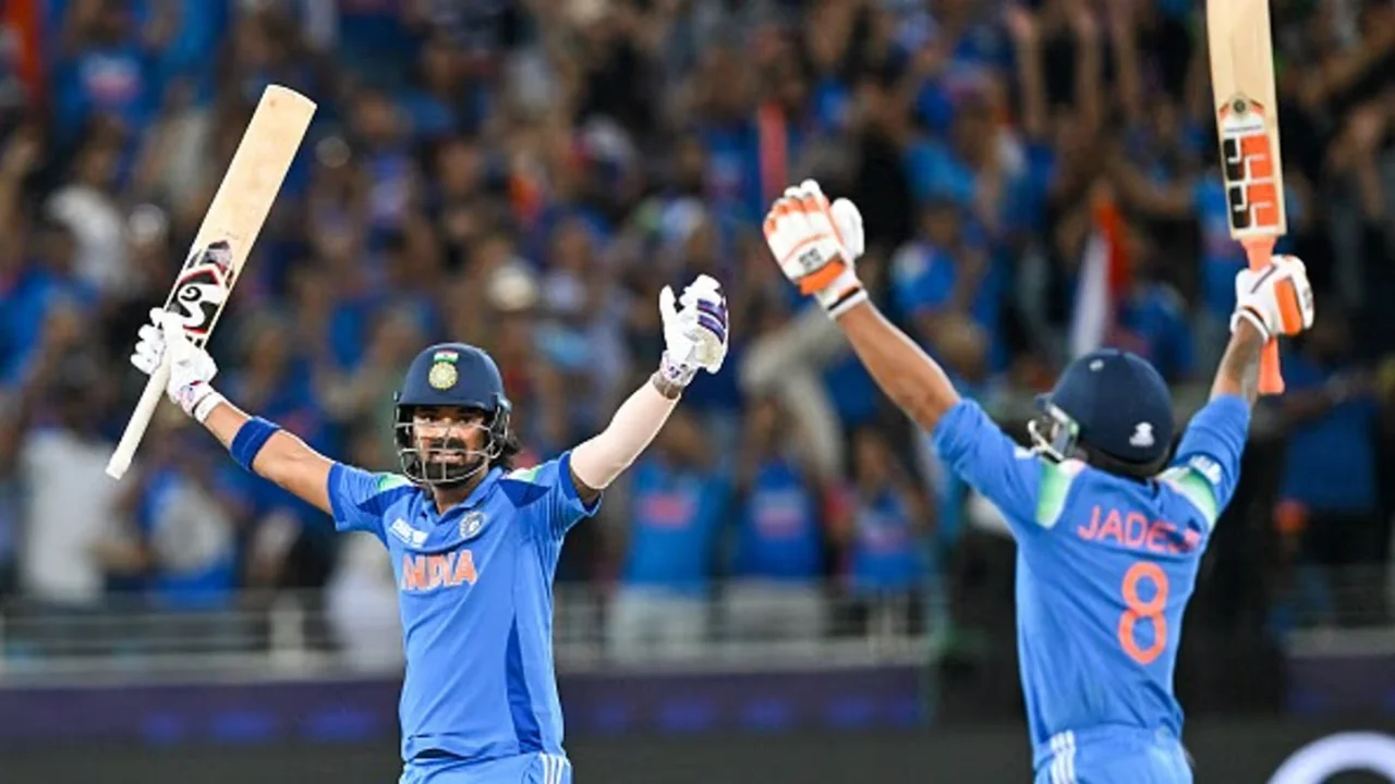 a group of men wearing helmets and holding up their hands